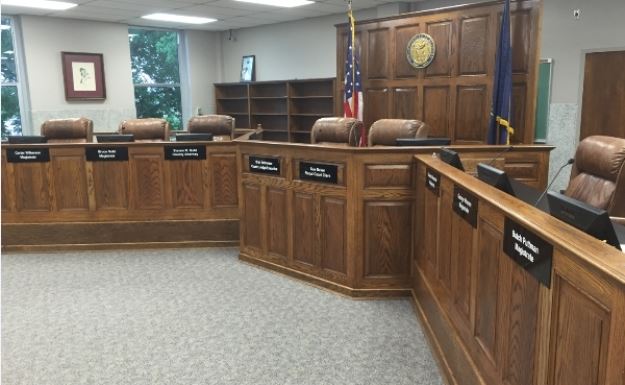 Fiscal Court Room With Wooden Seating Structure